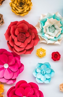 Colorful paper flowers that are perfect for decorations at a party. 