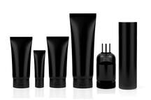 Black plastic cosmetic containers sitting in a straight line